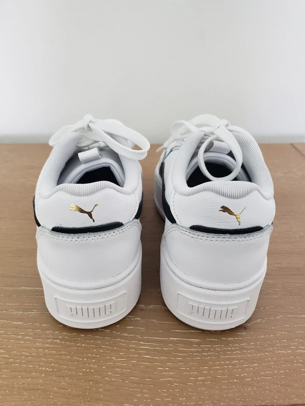 Women's Puma White Sneakers with Black Formstrip